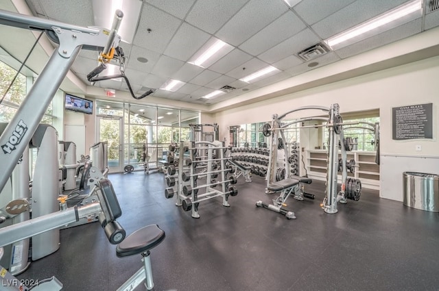 workout area featuring a drop ceiling