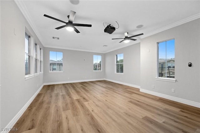 unfurnished room with light hardwood / wood-style flooring, ceiling fan, and crown molding