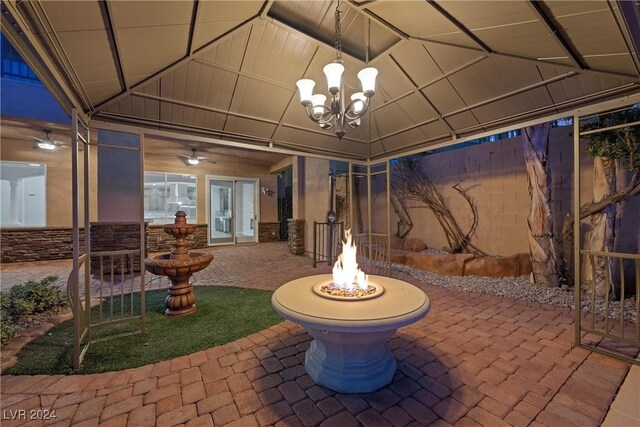 view of patio featuring an outdoor fire pit