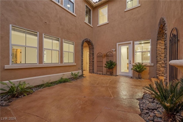 exterior space with stucco siding