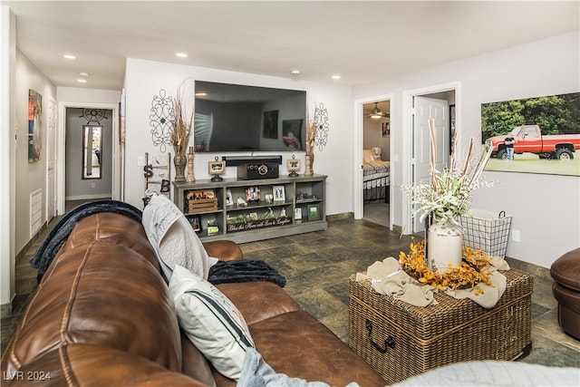 living room featuring ceiling fan