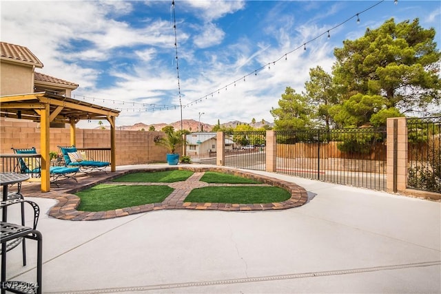 view of yard featuring a patio and a fenced backyard