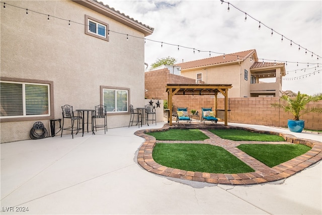 exterior space with a pergola, a patio area, and a gazebo