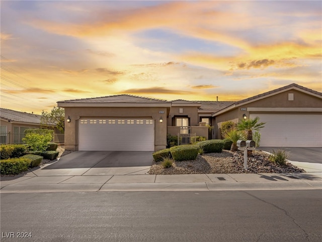 prairie-style home featuring a garage