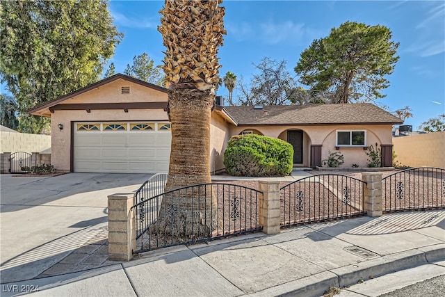 ranch-style home featuring a garage