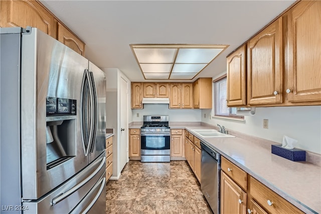 kitchen featuring appliances with stainless steel finishes and sink