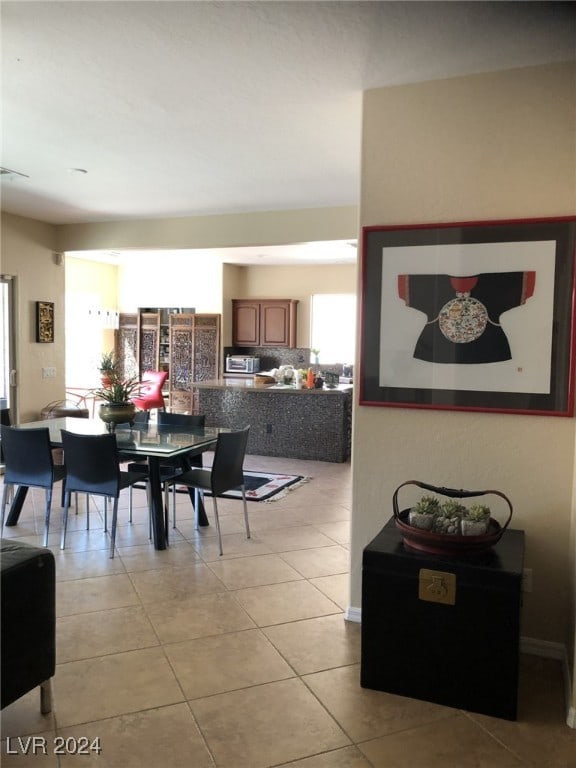 view of tiled dining area