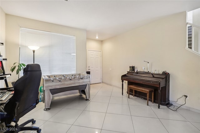 home office featuring light tile patterned flooring