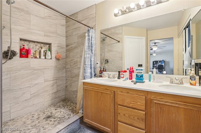 bathroom featuring vanity, ceiling fan, a shower with shower curtain, and tile patterned floors