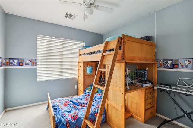 carpeted bedroom featuring ceiling fan