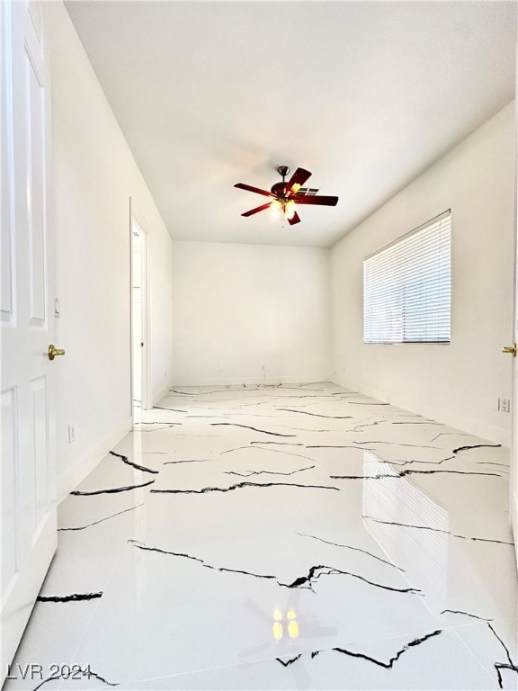 empty room with ceiling fan