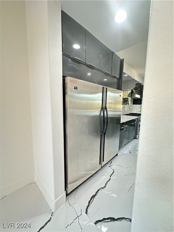 kitchen with stainless steel fridge