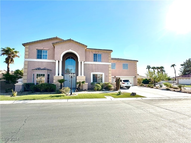 view of front of property featuring a garage