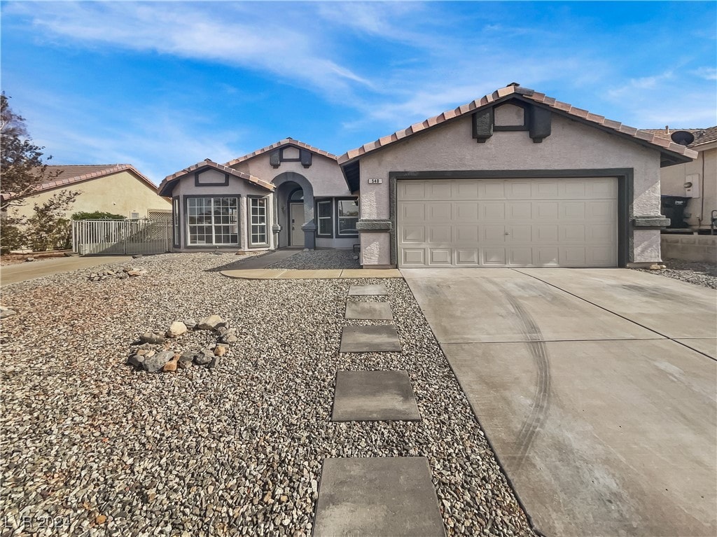 view of front of property with a garage