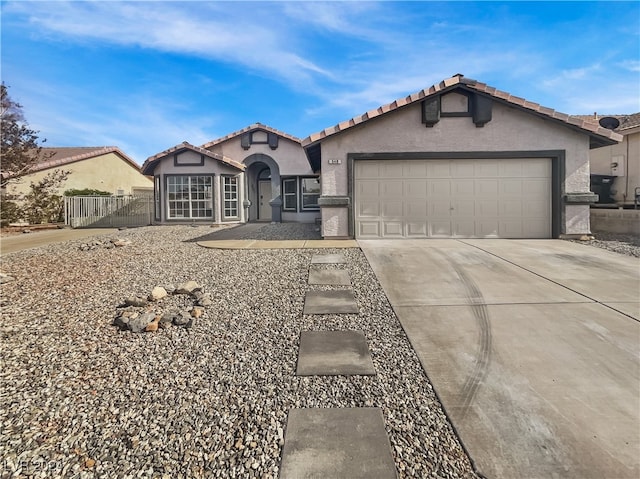 view of front of property with a garage