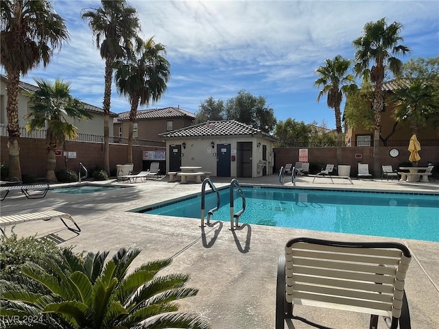 view of swimming pool with a patio area