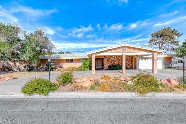 ranch-style house with a garage