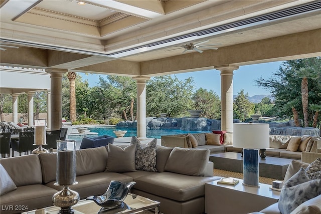 view of patio with ceiling fan and outdoor lounge area