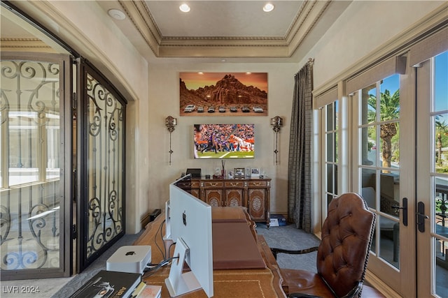 home office featuring french doors, crown molding, and a tray ceiling