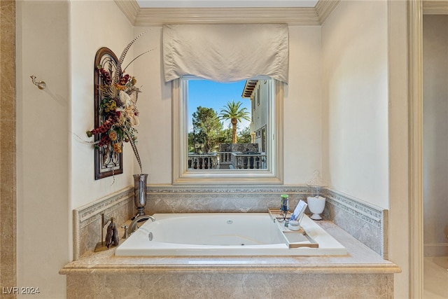 bathroom with crown molding and tiled tub