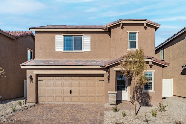 view of property featuring a garage