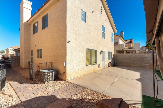 rear view of house with a patio area