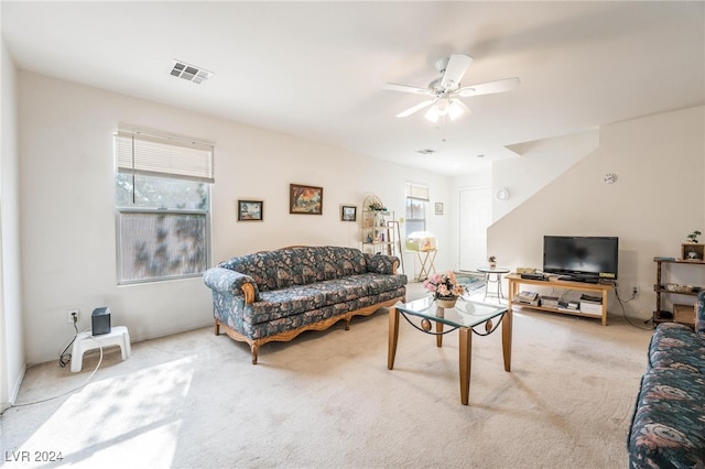 living room featuring ceiling fan and carpet flooring