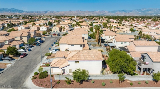 bird's eye view with a mountain view