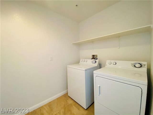 laundry area with separate washer and dryer