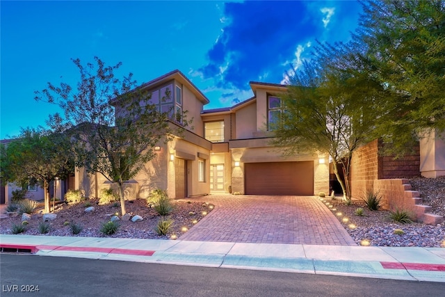 view of front of property featuring a garage