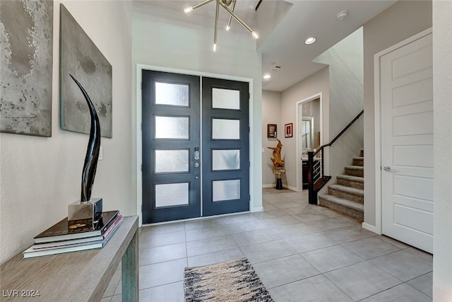 tiled foyer entrance with french doors