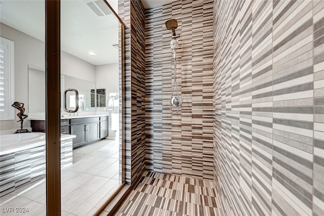 bathroom with vanity and walk in shower