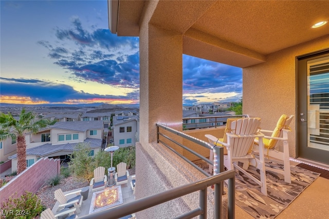 view of balcony at dusk