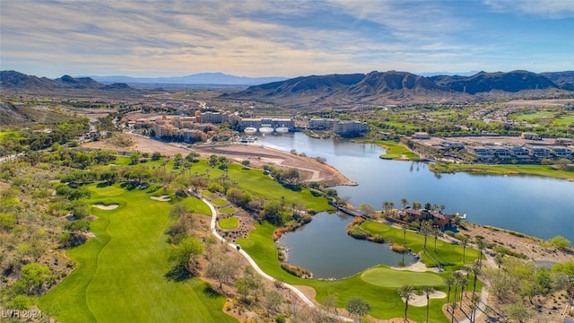 aerial view featuring a water and mountain view