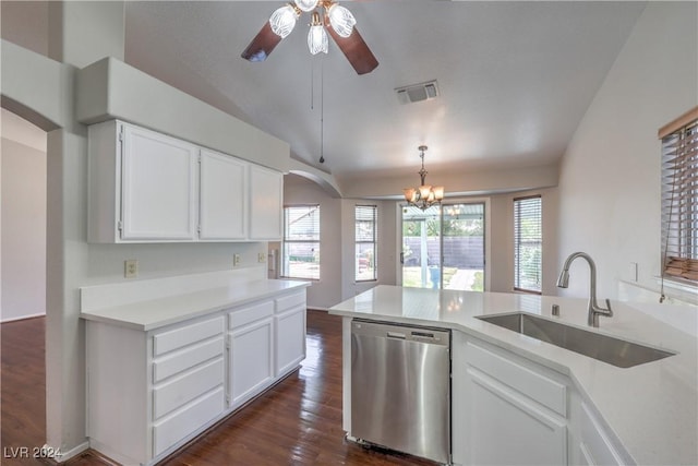 kitchen featuring arched walkways, a sink, visible vents, a wealth of natural light, and dishwasher