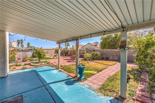 view of patio featuring a fenced backyard