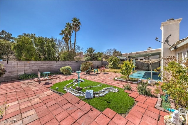 exterior space with a fenced backyard