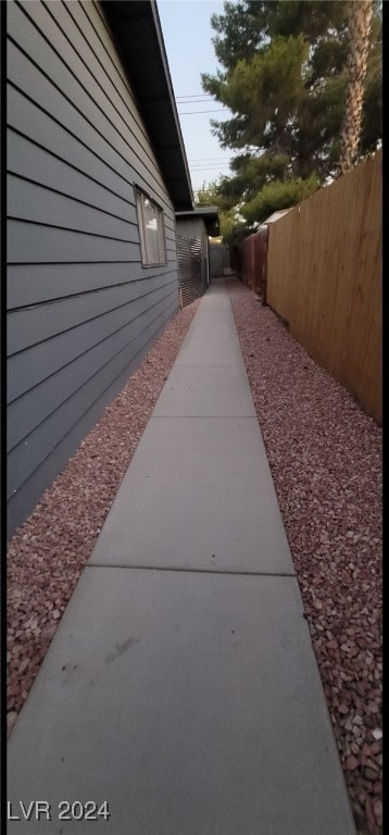 view of side of home with a patio