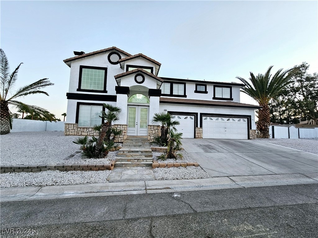 view of property featuring a garage