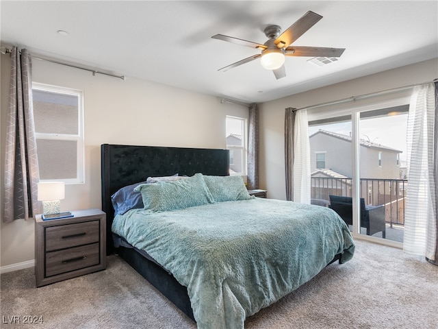 bedroom with access to exterior, carpet flooring, and ceiling fan