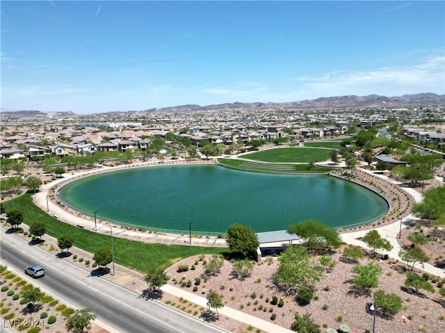 bird's eye view featuring a water and mountain view