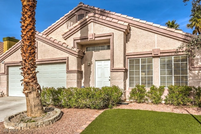 view of front of home with a garage