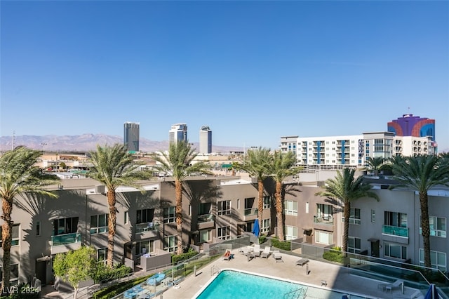 view of pool with a mountain view