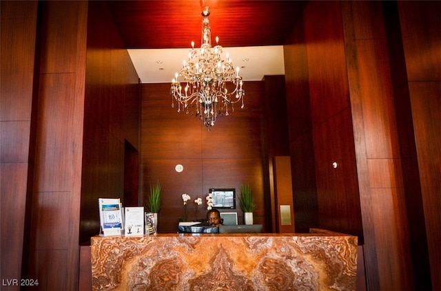 reception area with an inviting chandelier