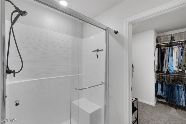 bathroom featuring an enclosed shower