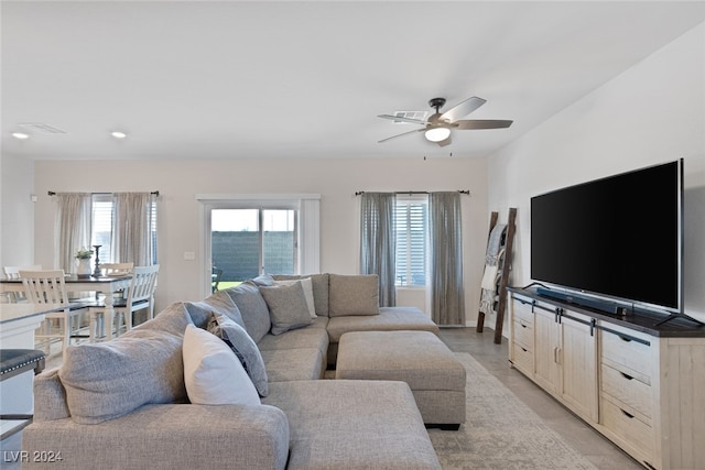 living room featuring ceiling fan