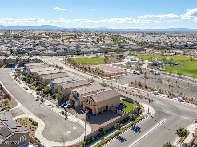 birds eye view of property featuring a mountain view