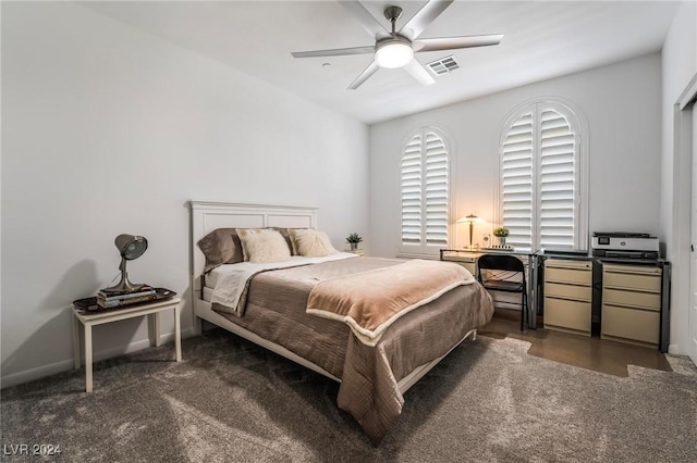 carpeted bedroom with ceiling fan