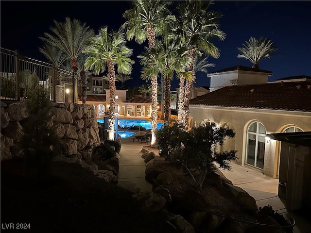 view of patio at night