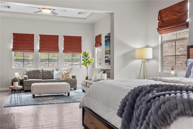 bedroom featuring hardwood / wood-style flooring and ceiling fan